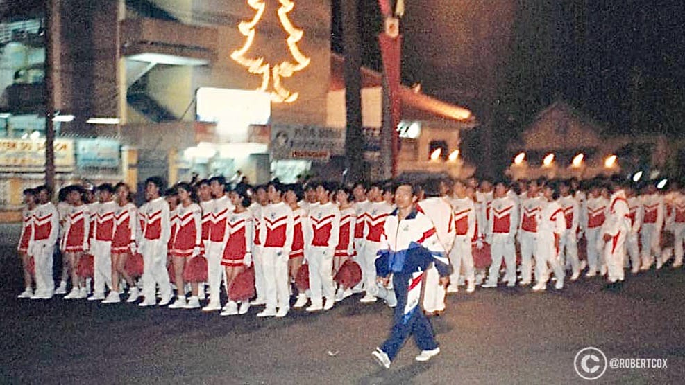 A group of marchers — mostly young women, dressed in coordinated uniforms — at rehearsals for the celebrations for the 20th anniversary of Reunification Day (April 28, 1995)