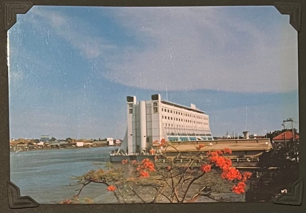 Postcard depicting Floating Hotel Saigon located in Ho Chi Minh City, Vietnam, near the Saigon River.