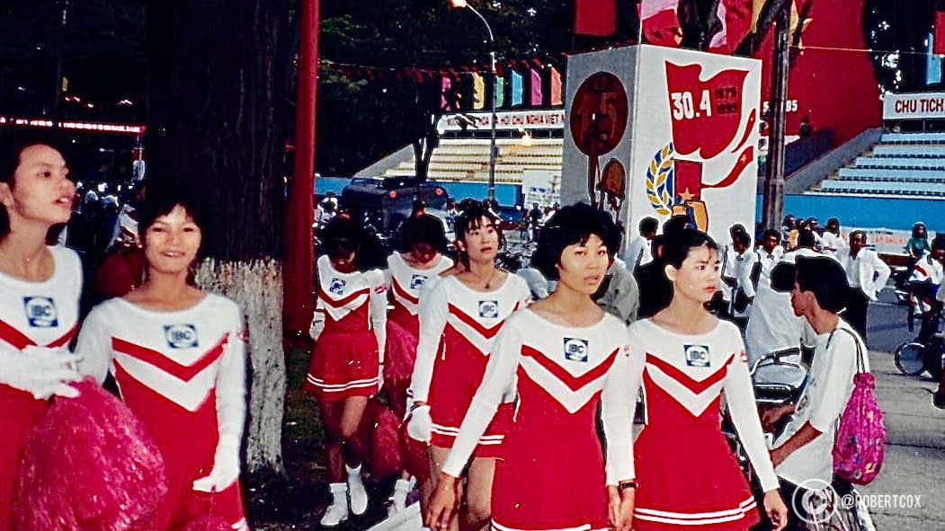 A group of cheerleaders dressed in red and white uniforms, at the parade rehearsal on April 28, 1995.